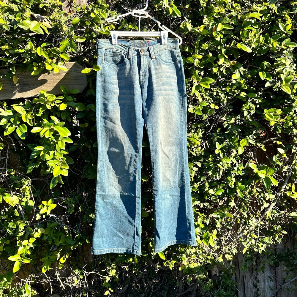 Embroidered light wash flare jeans